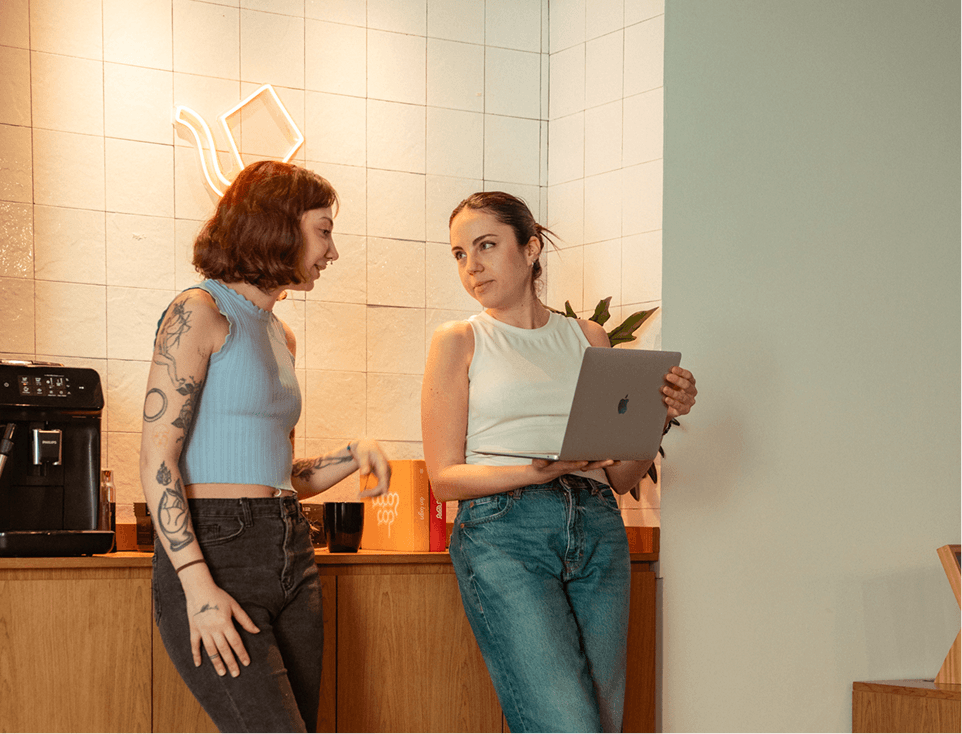 two people talking in the office